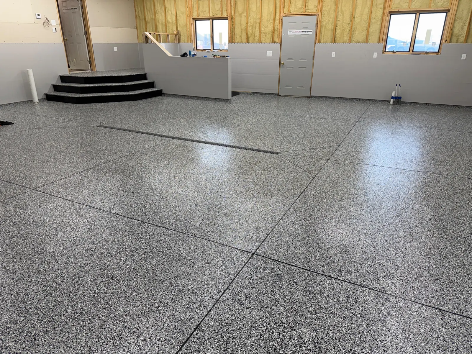 Large finished commercial resinous floor installed by E&M Coatings