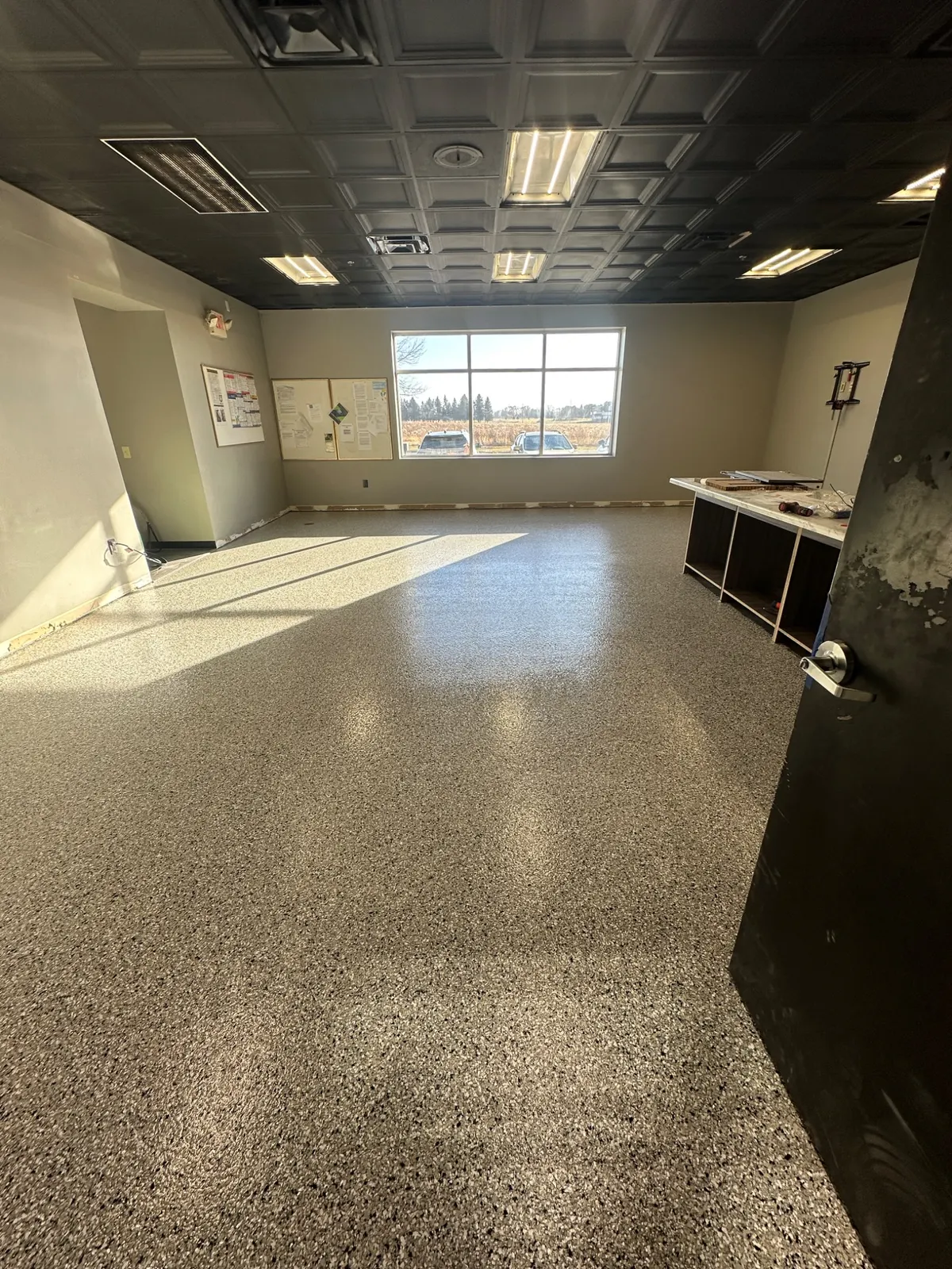 Finished commercial office resinous floor
