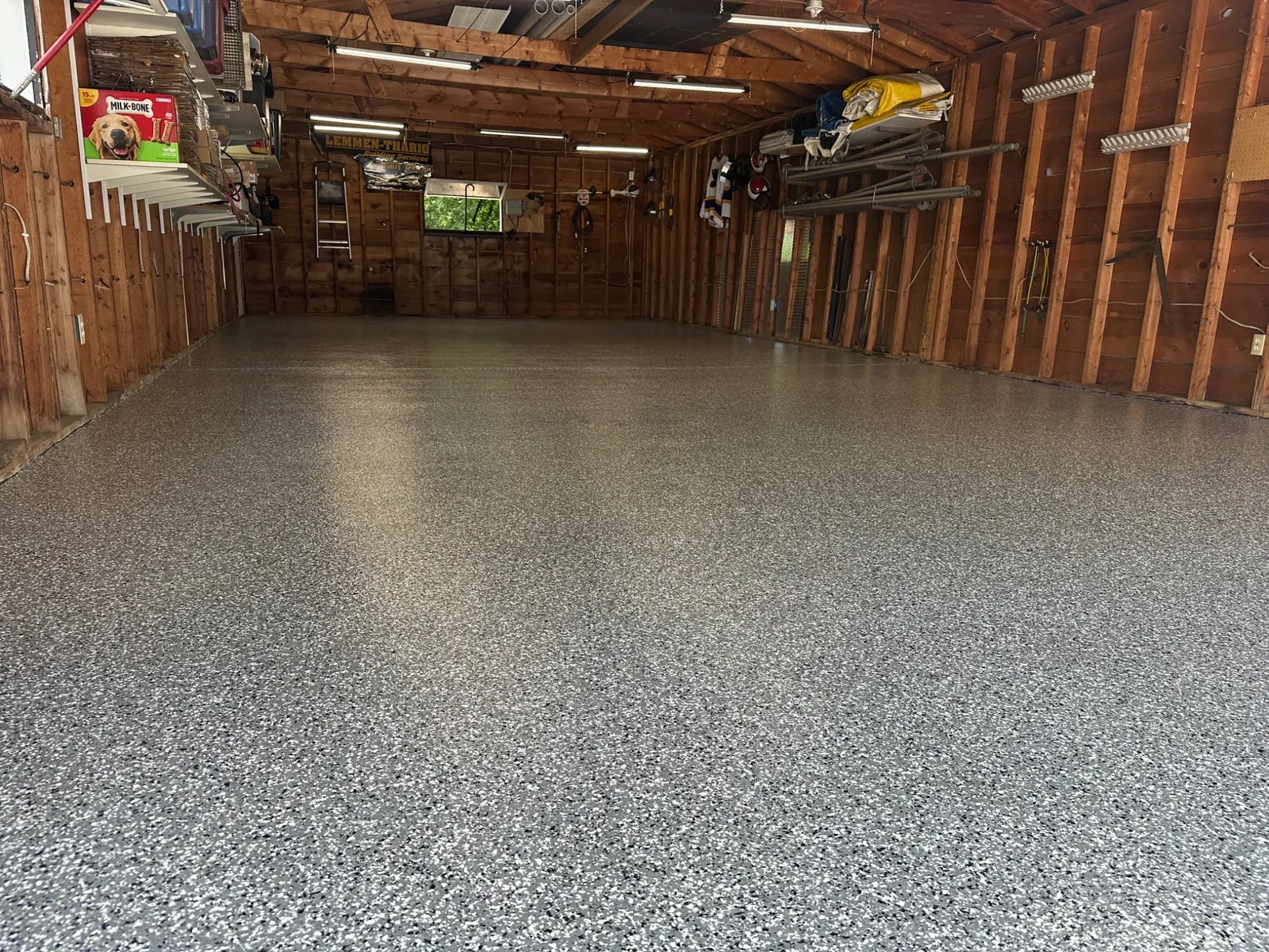 Finished decorative flake garage floor coating installed by E&M Coatings
